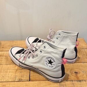 Converse High-Tops in White and Black with Pink Details